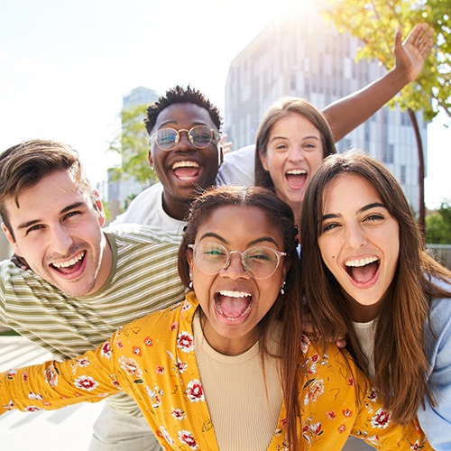 A group of friends smiling